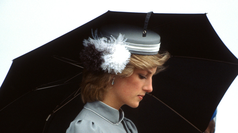 princess diana holding an umbrella