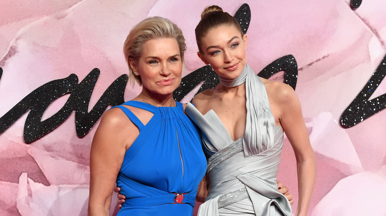 Yolanda and Gigi Hadid posing at event