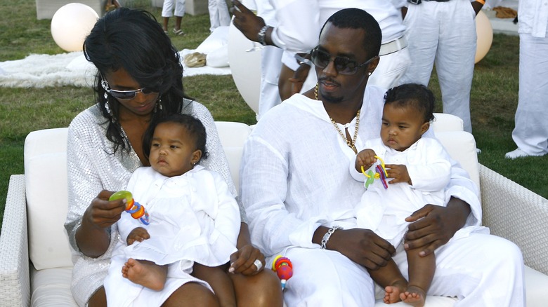 Kim Porter and Diddy with twins