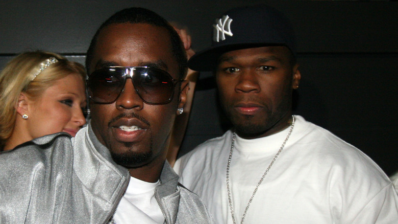 Sean "Diddy" Combs and 50 Cent posing