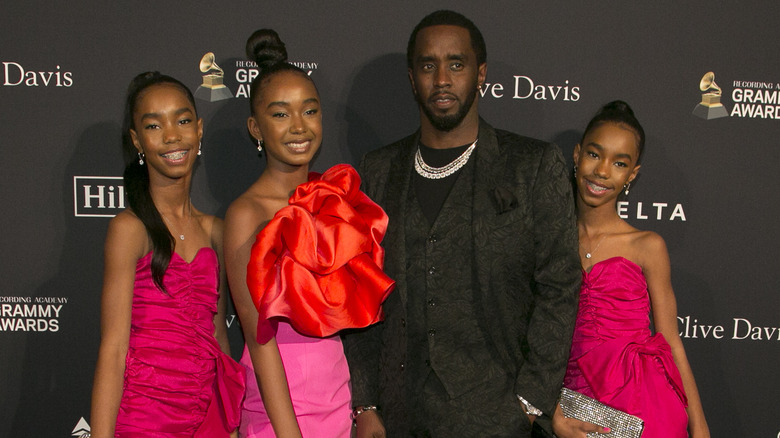 D'Lila, Jessie, and Chance Combs posing with Diddy