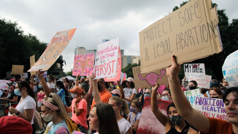 pro choice advocates holding signs