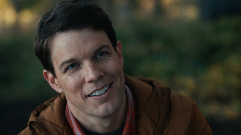 Jake Lacy smiling in Significant Other