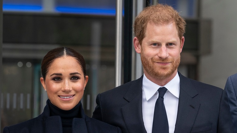 Prince Harry and Meghan Markle smiling 