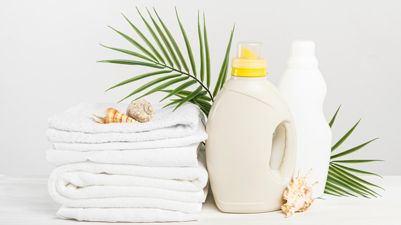 Fabric softener and detergent with clean, folded towels