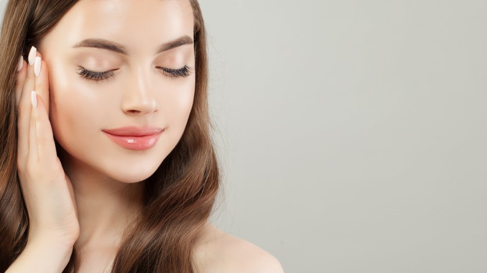 Facial steamer, woman with back to camera