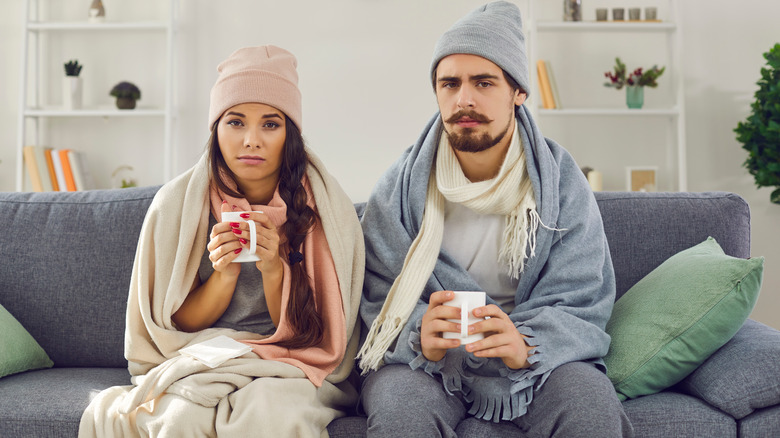 Woman and man looking grumpy 