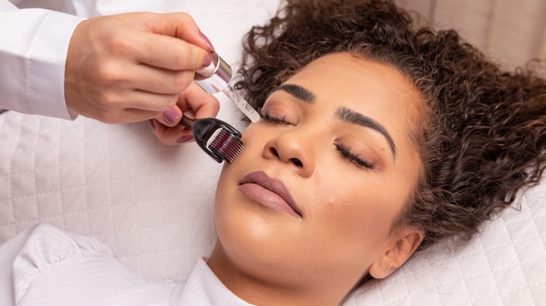 woman getting dermatologist skincare treatment