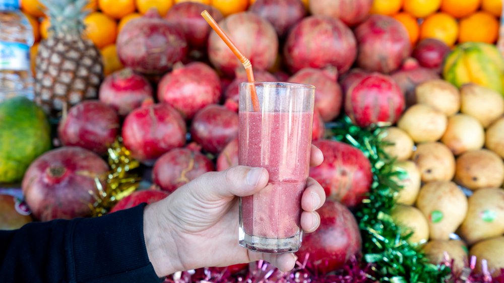 Juice with fruit background