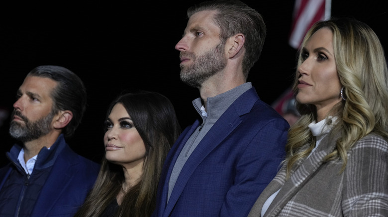 Kimberly Guilfoyle, Lara Trump , Eric Trump, and Don Jr. standing together 