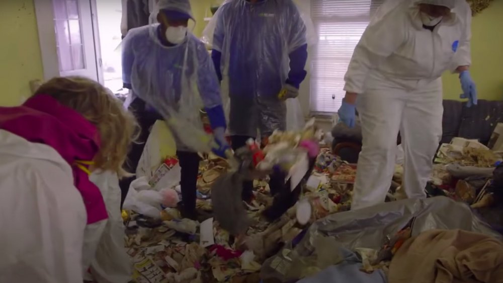 Cleanup team cleaning up a hoarder's house