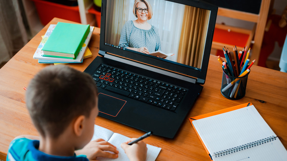 Boy taking online class