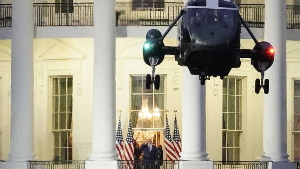 Trump with chopper in foreground