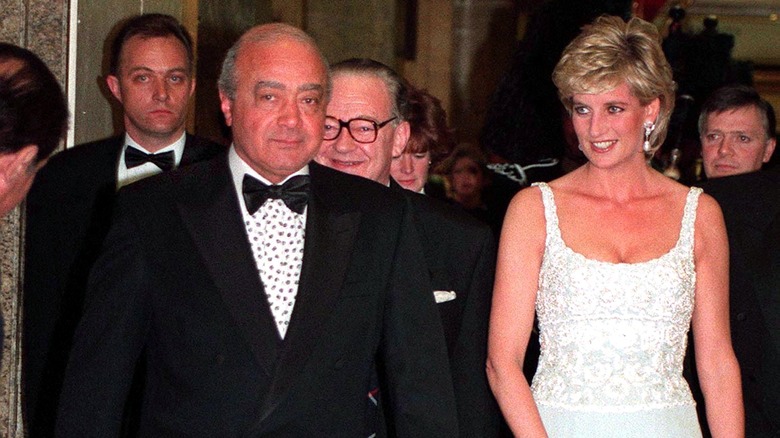 Mohamed Al-Fayed walking with Princess Diana