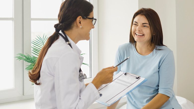 woman consulting doctor