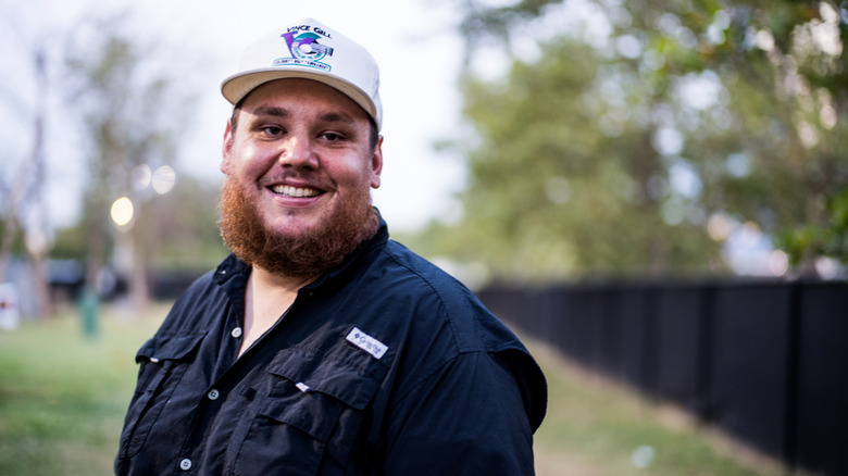 Luke Combs smiles while in Nashville