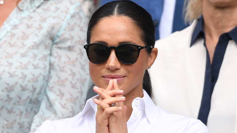 Meghan, Duchess of Sussex in the Royal Box on Centre Court during day twelve of the Wimbledon Tennis Championships