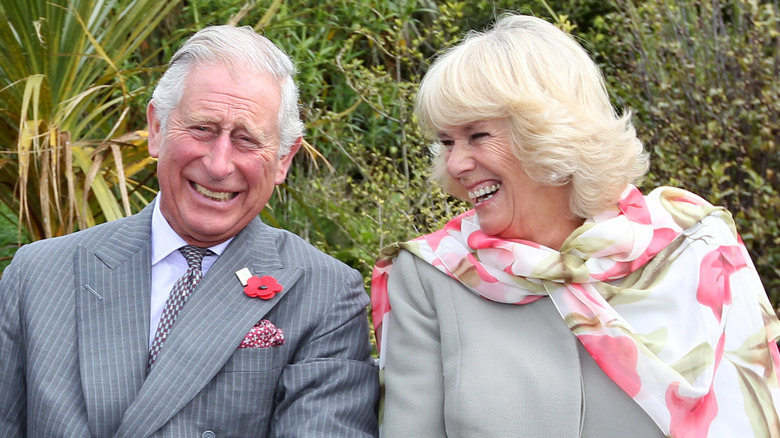 Charles and Camilla share a giggle