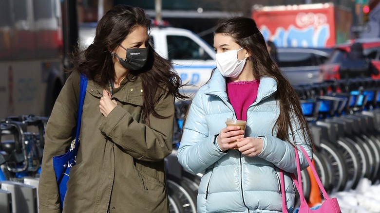 Katie Holmes and Suri Cruise walking in cold weather in 2021