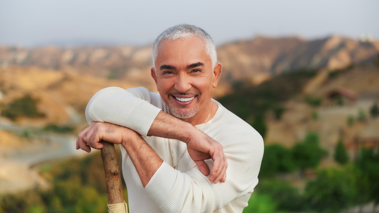 Cesar Millan smiling outdoors