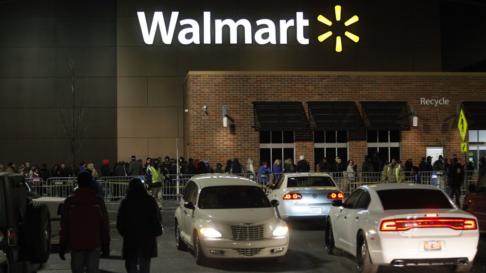 People waiting outside Walmart