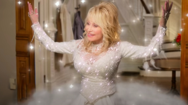 Dolly Parton appearing in the Netflix film "Christmas on the Square"