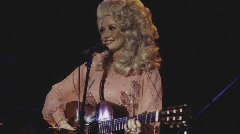 Dolly Parton performing in 1977