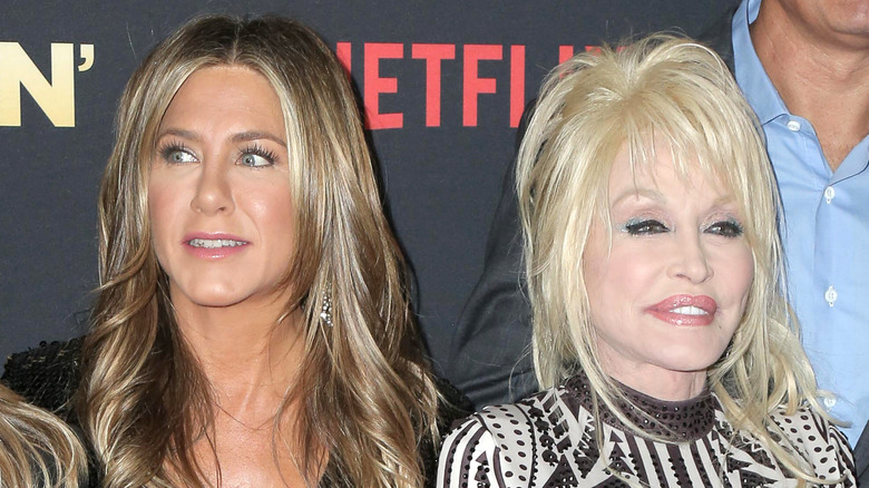 Jennifer Aniston and Dolly Parton at a Netflix event