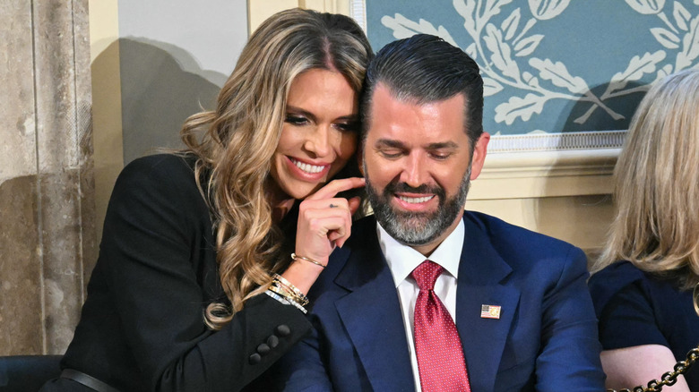 Donald Trump Jr. and Bettina Anderson smiling together