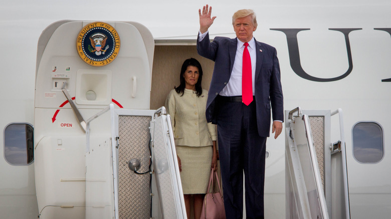 Nikki Haley standing behind Donald Trump on Air Force One