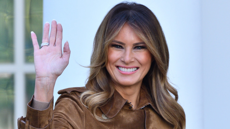 Melania Trump smiles and waves