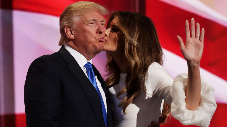 Melania Trump kissing Donald Trump