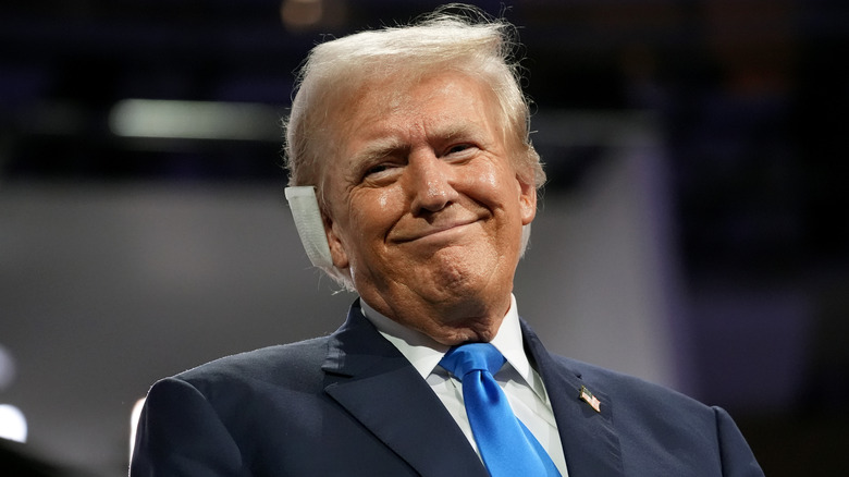 Donald Trump smiling bandaged ear