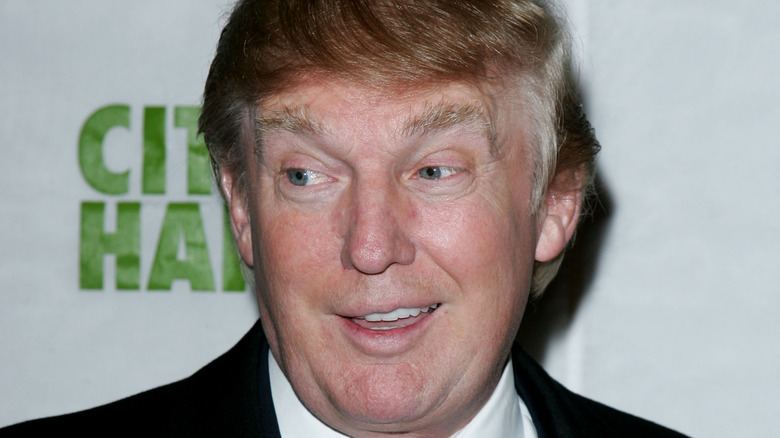 Donald Trump smiling at an event in 2006