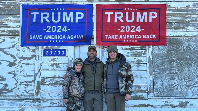 Donald Trump Jr. posing with two sons