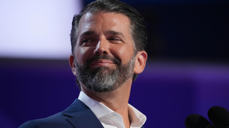 Donald Trump Jr. looking up smug smile