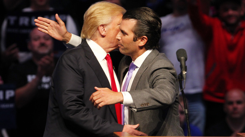 Trump and Don. Jr. hugging