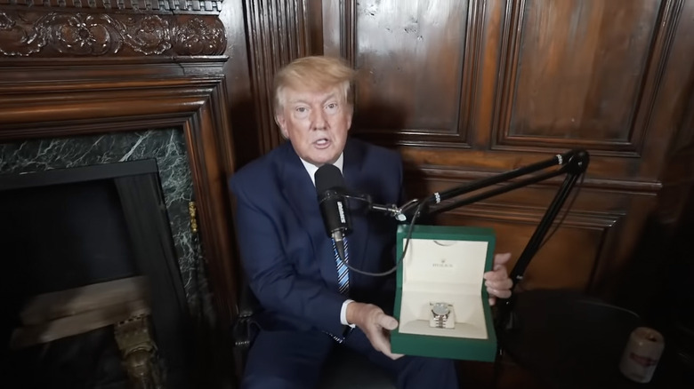 Donald Trump holding a Rolex during an appearance on the Nelk Boys' podcast