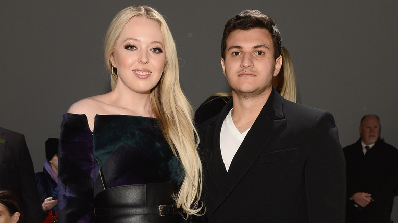 Tiffany Trump and Michael Boulos stand side by side