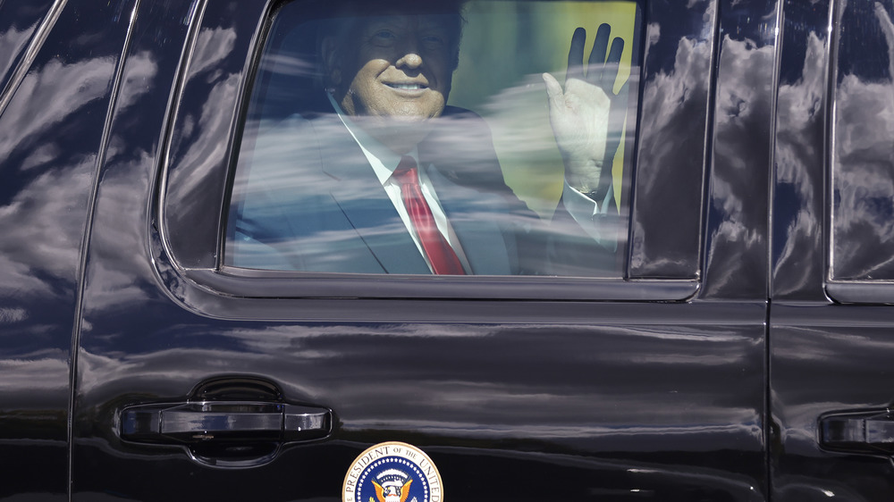 Donald Trump waving to supporters