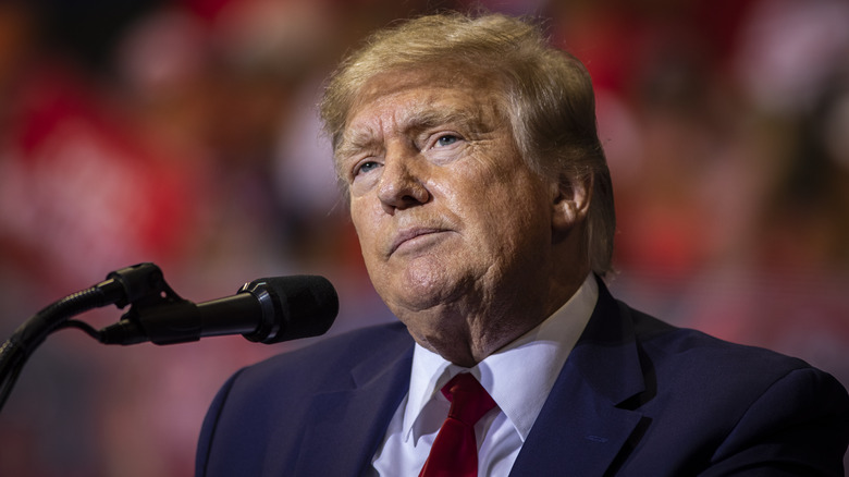 Donald Trump microphone red tie