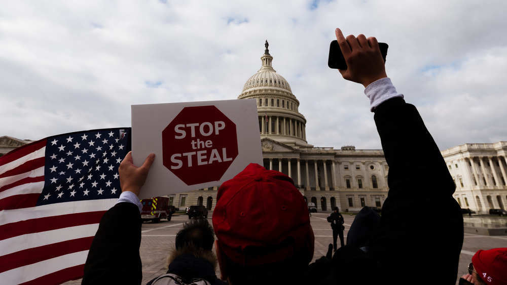 Stop the Steal sign raised