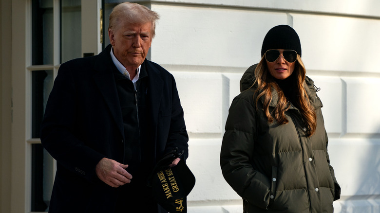 Donald Trump and (possibly) Melania Trump departing the White House for first trip as president and first lady