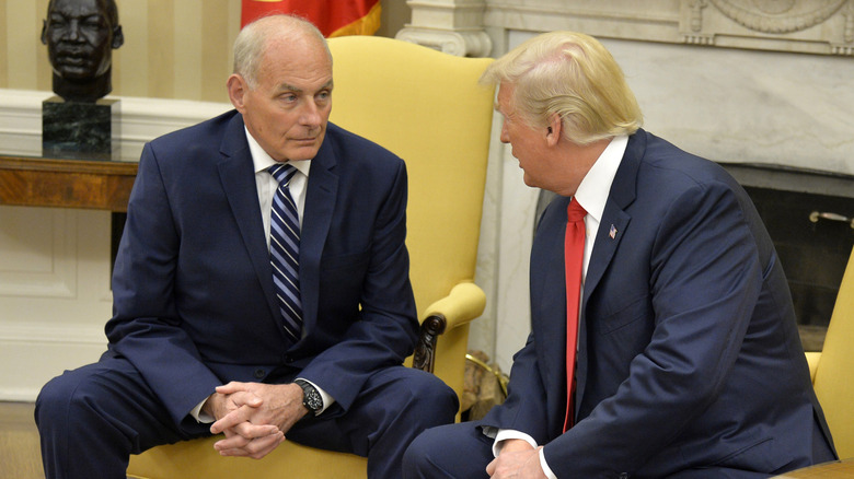 John F. Kelly and Donald Trump sitting next to each other in the oval office