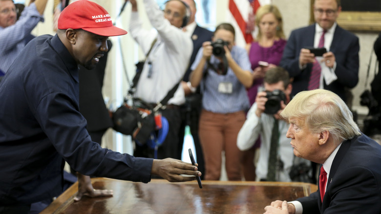 Kanye West and Donald Trump talking