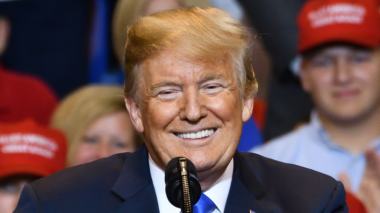 Donald Trump smiling at rally