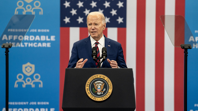 Joe Biden delivering speech at podium