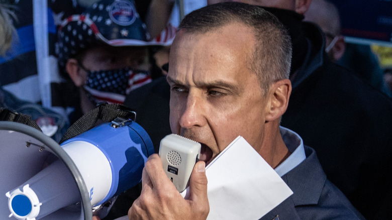 Corey Lewandowski speaking into megaphone