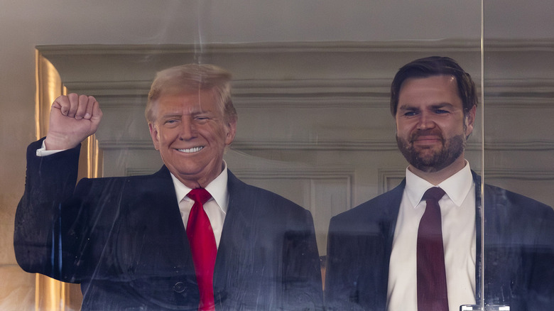 Donald Trump and JD Vance smiling