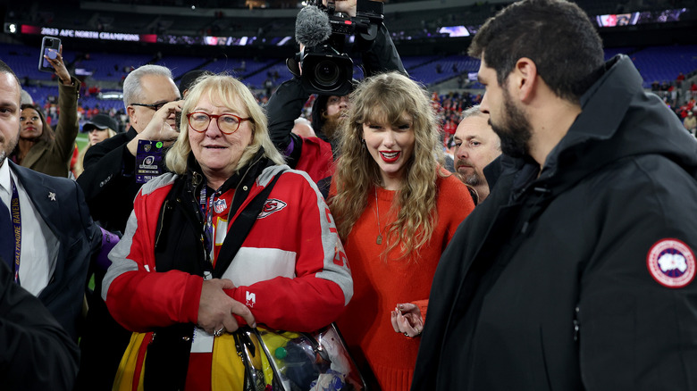 Donna Kelce and Taylor Swift standing together after a football game